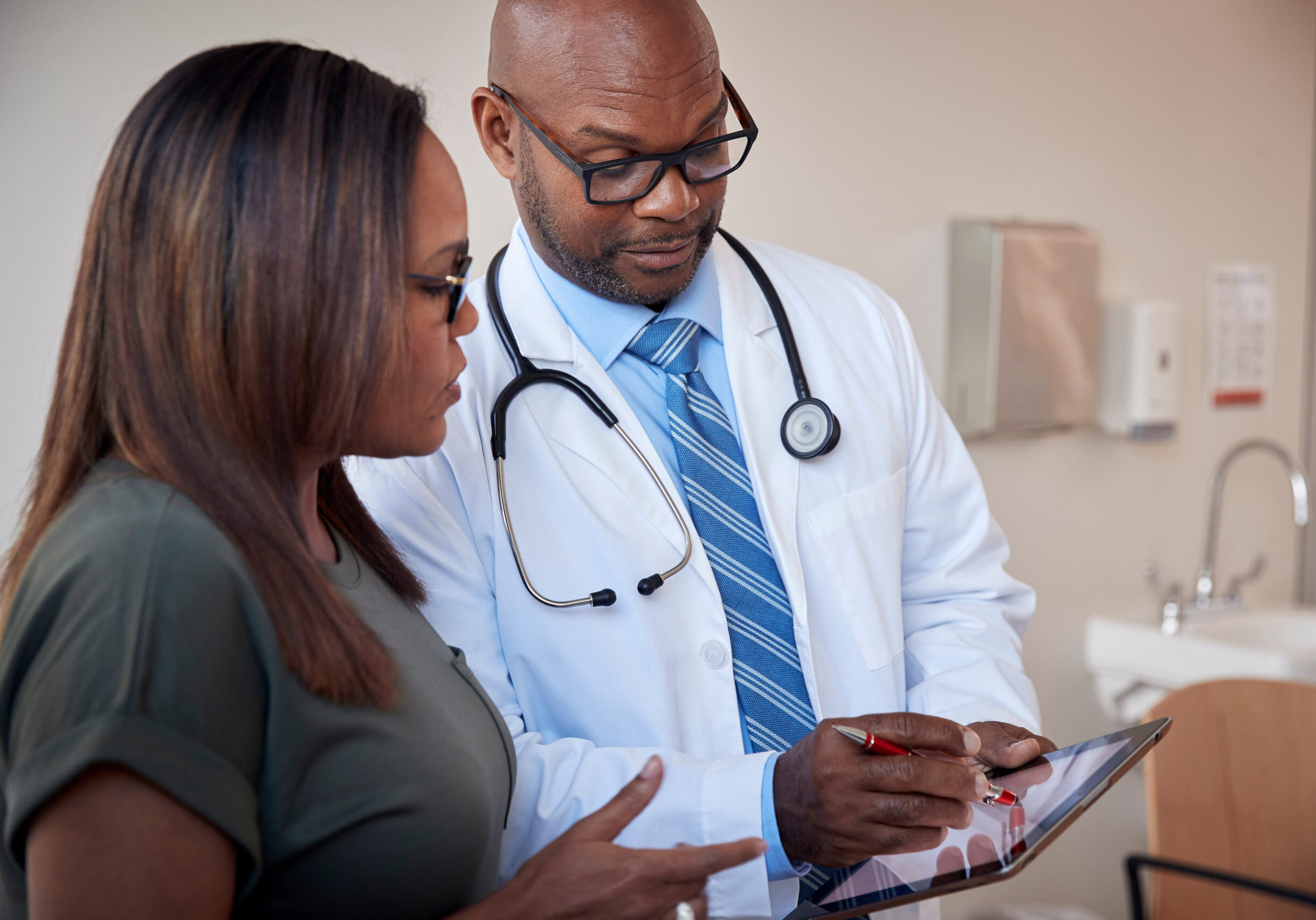 Doctor talking to woman Doctor talking to woman