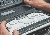 Person using braille screen reader.